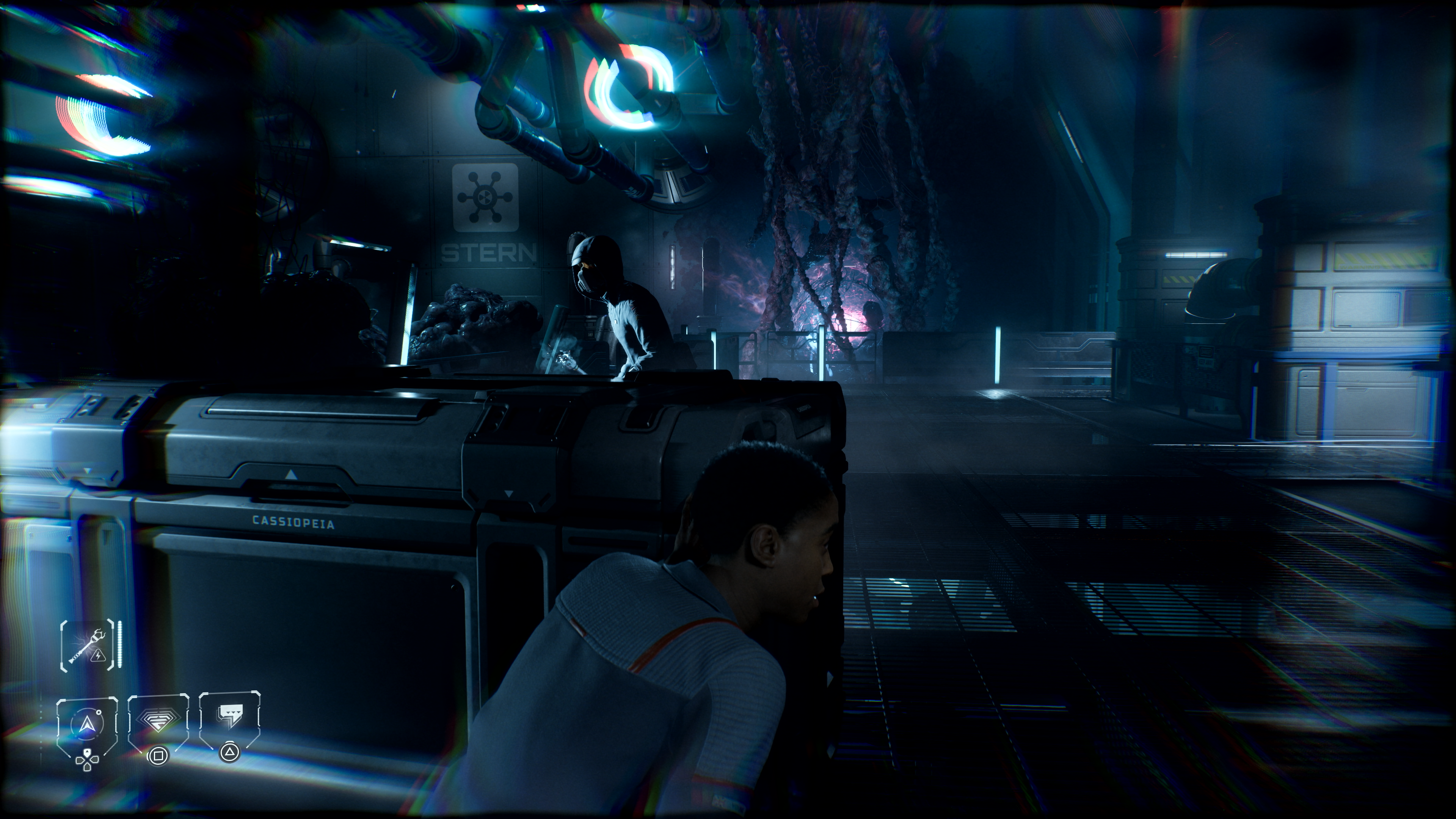 A character crouching behind a large box as a shapeshifted alien stalks trying to find them.