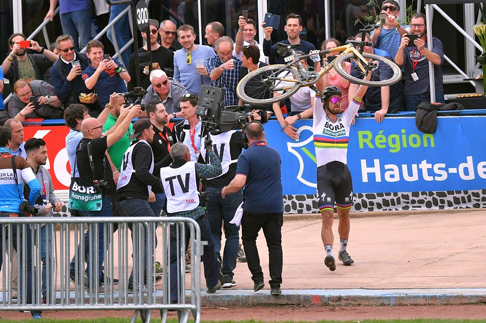 Peter Sagan holds up his bike after winning Paris-Roubaix