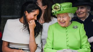 chester, england june 14 queen elizabeth ii sitts and laughs with meghan, duchess of sussex during a ceremony to open the new mersey gateway bridge on june 14, 2018 in the town of widnes in halton, cheshire, england meghan markle married prince harry last month to become the duchess of sussex and this is her first engagement with the queen during the visit the pair will open a road bridge in widnes and visit the storyhouse and town hall in chester photo by jeff j mitchellgetty images