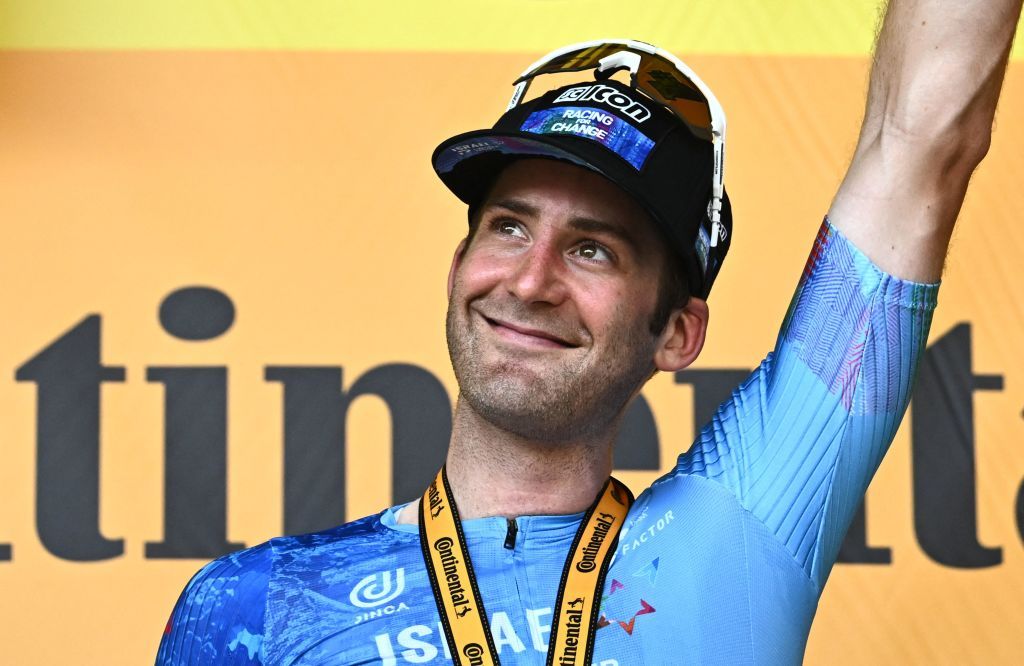 IsraelPremier Tech teams Canadian rider Hugo Houle celebrates on the podium after winning the 16th stage of the 109th edition of the Tour de France cycling race 1785 km between Carcassonne and Foix in southern France on July 19 2022 Photo by AnneChristine POUJOULAT AFP Photo by ANNECHRISTINE POUJOULATAFP via Getty Images