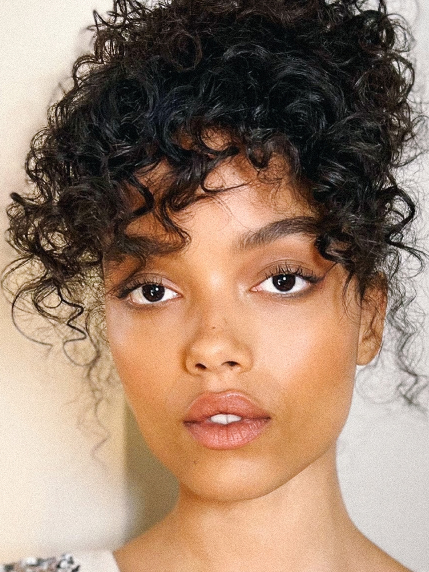 Whitney Peak wearing neutral-toned makeup.