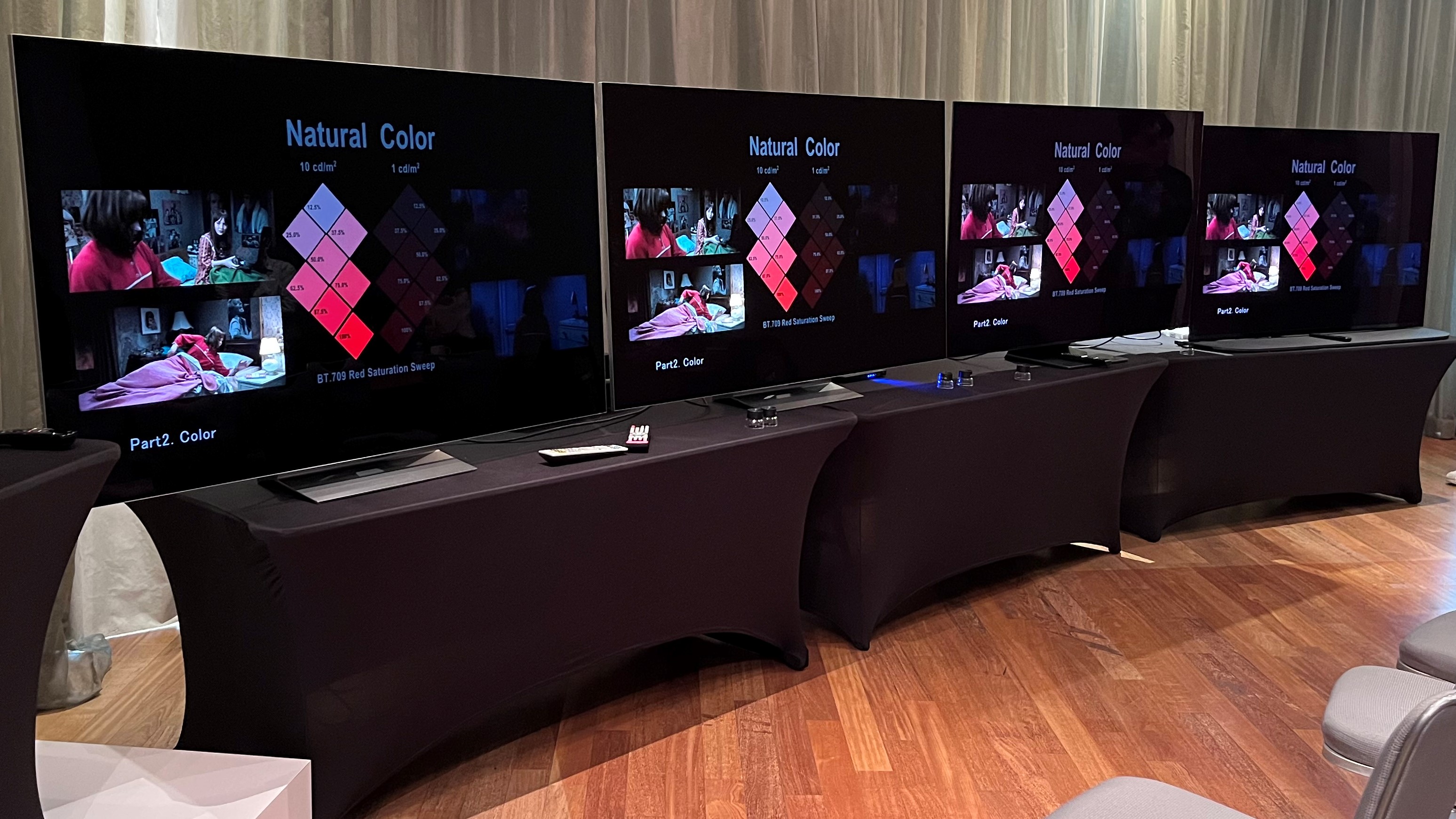 LG G3 OLED TV with other TVs showing test pattern