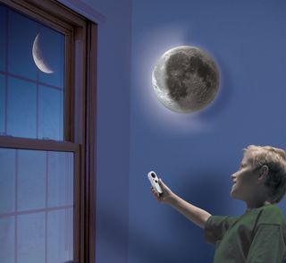 Super Moon In My Room by Uncle Milton is a wall-mounted moon lamp that can sync up with the real phases of the moon. It is 30-percent larger that Uncle Milton's earlier Moon In My Room and plays Neil Armstrong's historic words from the Apollo 11 moon land