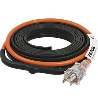 A black and orange heat cable rolled up with a plug on the end. 