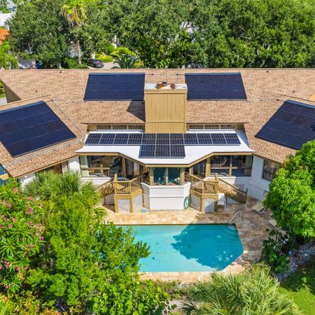 birds eye view of the ABBA home with pool in the garden