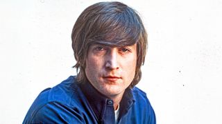 John Lennon of the rock and roll band "The Beatles" poses for a portrait in circa 1966. 