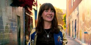 Sophia smiling in Girlboss