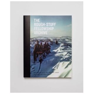 A book cover of cyclists pushing bikes through a snowdrift