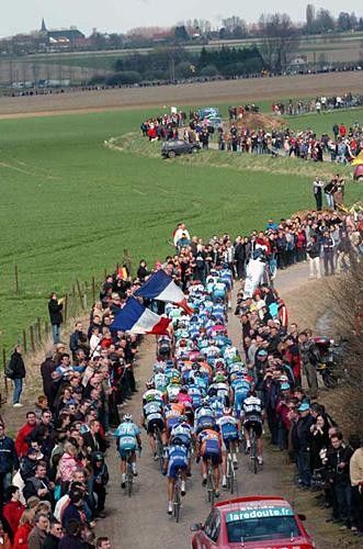 The bunch passes over one section of cobbles