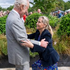 Duchess Sophie curtseying to King Charles at a flower show