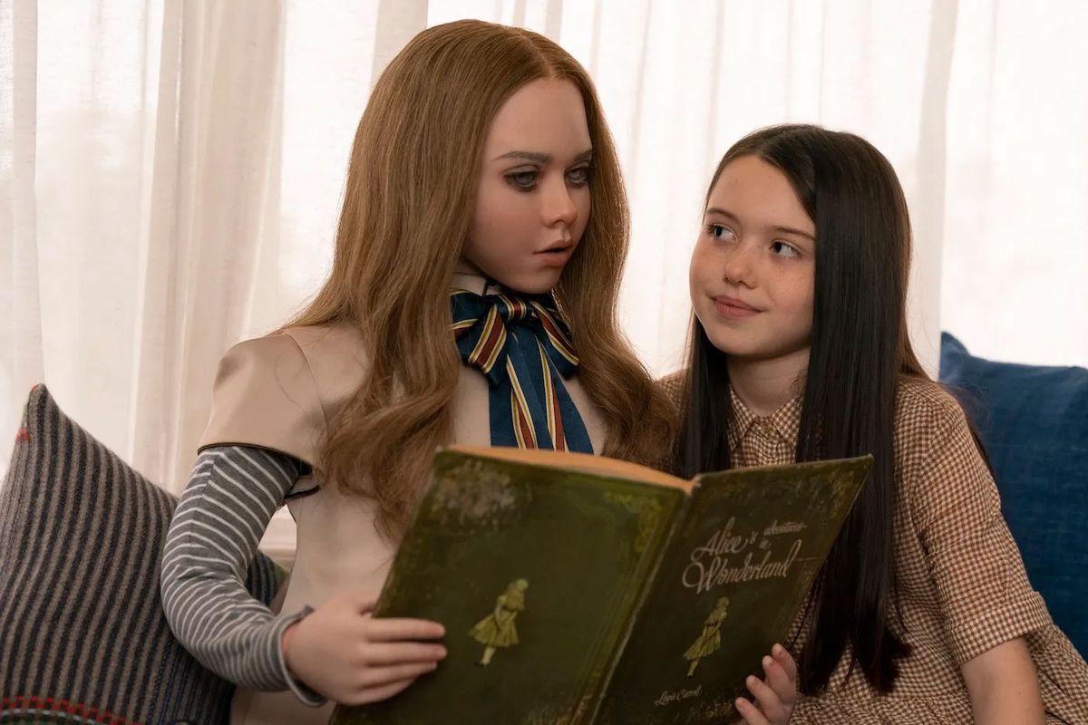 M3GAN and Cady reading a book