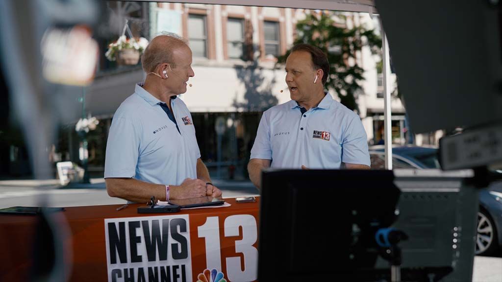 WNYT anchor Mark Mulholland (l.) and chief meteorologist Paul Caiano report from Troy for one of the station&#039;s ‘Around the 518’ segments. 