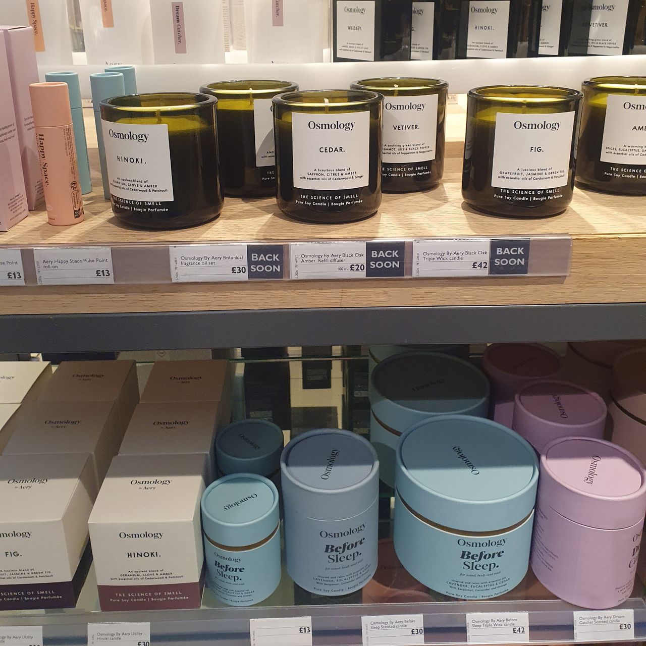 Scented candles from Osmology by Aery displayed at John Lewis
