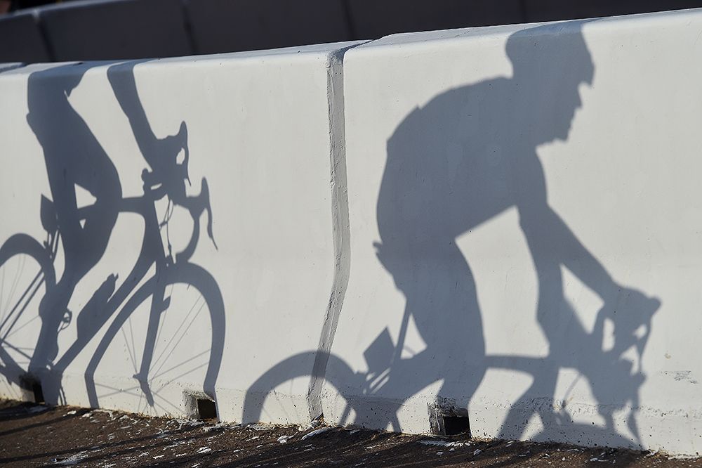 Riders cast a shadow during stage 3