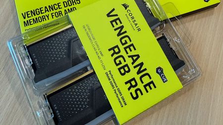 Corsair DDR5 RAM sticks shown in new plastic clamshell packaging with bright green label