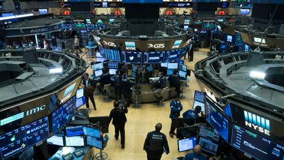 Traders on the floor of the New York Stock Exchange (NYSE) 