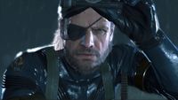 Snake looks to camera wearing his eyepatch in Ground Zeroes.
