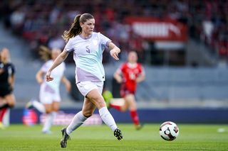Maren Mjelde of Norway passes the ball during the UEFA Women's Nations League 2024/25 Grp A2 MD6 match between Switzerland and Norway at Stade de Tourbillon on June 03, 2025 in Sion, Switzerland.