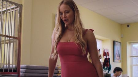 Jennifer Lawrence in a pink dress in No Hard Feelings