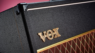 Vox AC30 vs Vox AC15: Close up of Vox badge on an AC15
