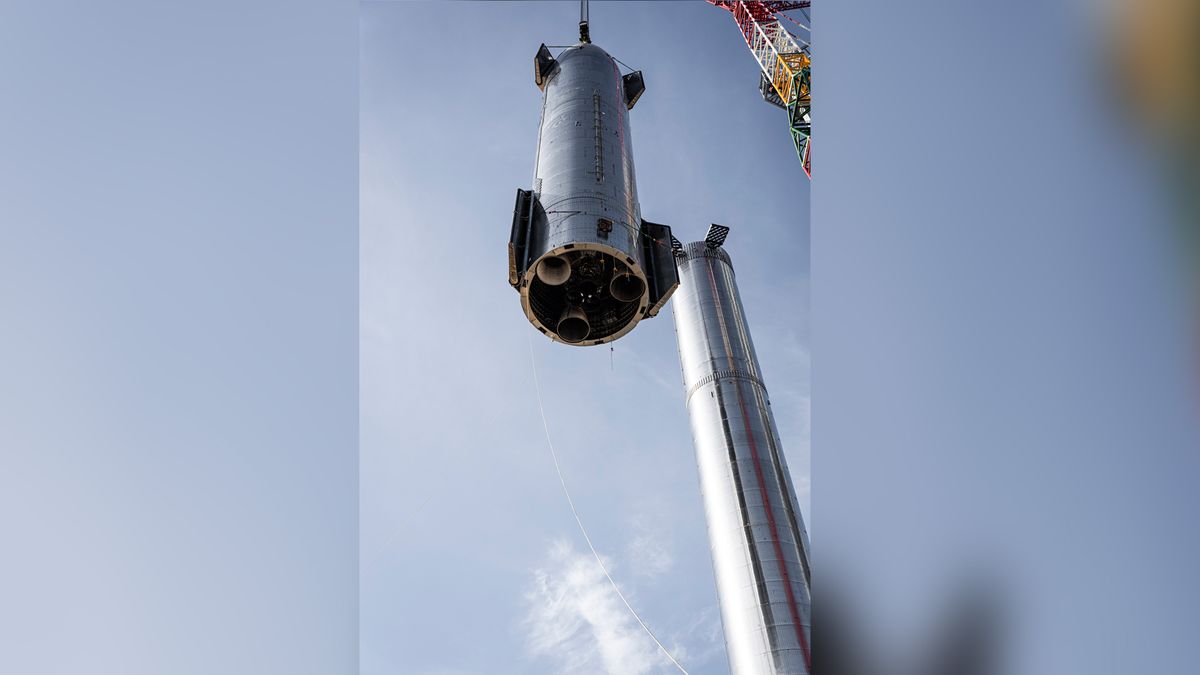 SpaceX's first orbital Starship SN20 is stacked atop its massive Super Heavy Booster 4 for the first time on Aug. 6, 2021 at the company's Starbase facility near Boca Chica Village in South Texas. They stood 395 feet tall, taller than NASA's Saturn V moon rocket.