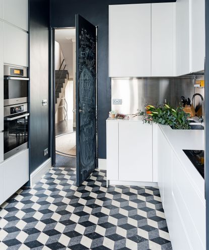 Kitchen flooring costs in a monochrome scheme with patterned tiles.
