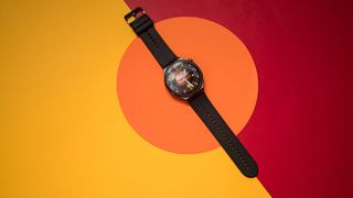 Honor Watch 5 Ultra against colorful background