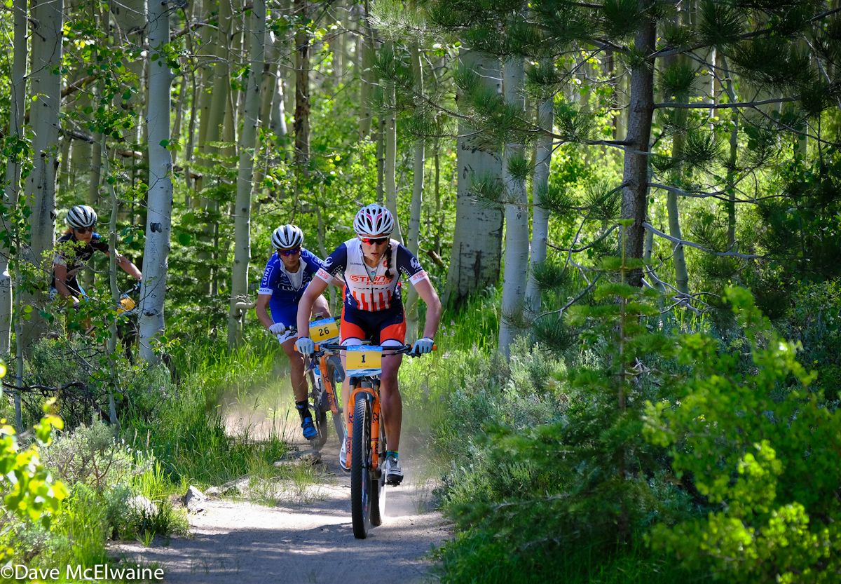 Rose Grant (Stans NoTubes-Pivot) leading Katerina Nash at Spooner Lake