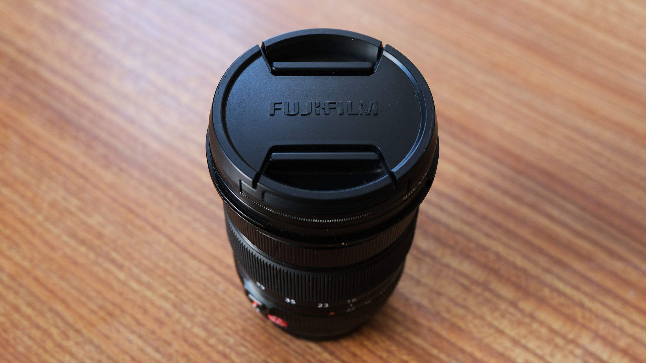 The Fujifilm XF 16-55mm f/2.8 lens LM WR II with the lens cap attached