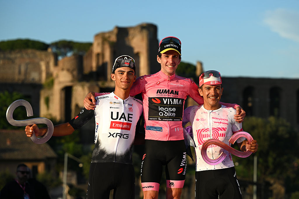 ROME ITALY JUNE 01 LR Isaac Del Toro of Mexico and Team UAE Team Emirates XRG on second place race winner Simon Yates of Great Britain and Team Visma Lease a Bike Pink Leader Jersey and Richard Carapaz of Ecuador and Team EF Education EasyPost on third place celebrate on the podium ceremony after the 108th Giro dItalia 2025 Stage 21 a 1448km stage from Rome to Rome UCIWT on June 01 2025 in Rome Italy Photo by Dario BelingheriGetty Images