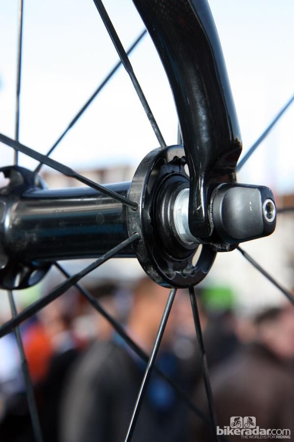 Shimano's new front wheel features very widely spaced flanges, the company's so-called 'indexed' bearing adjustment, and paired spoke heads.