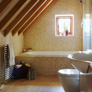 bathroom with mosaic tiles and underfloor heating