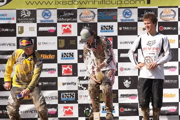 The elite men's podium of the iXS Downhill Cup in Leogang, Austria