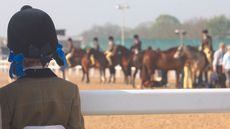 Young competitor watches a showing class