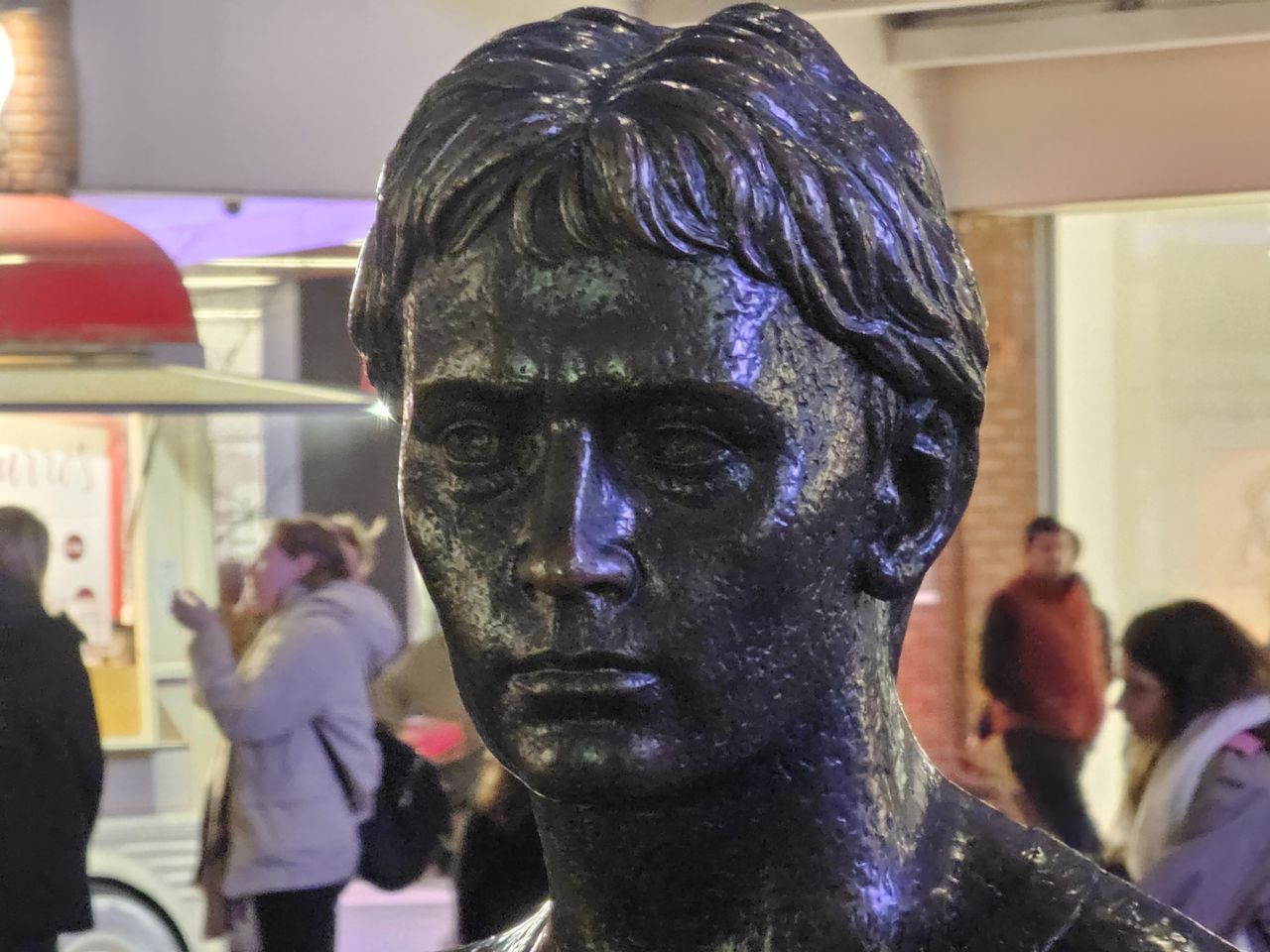 statues of a man and children