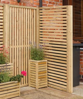 slatted timber screens used to screen wheelie bin storage