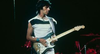 Jeff Beck plays his 1954 Fender Stratocaster onstage at a Ronnie Lane ARMS Benefit Concert in 1983