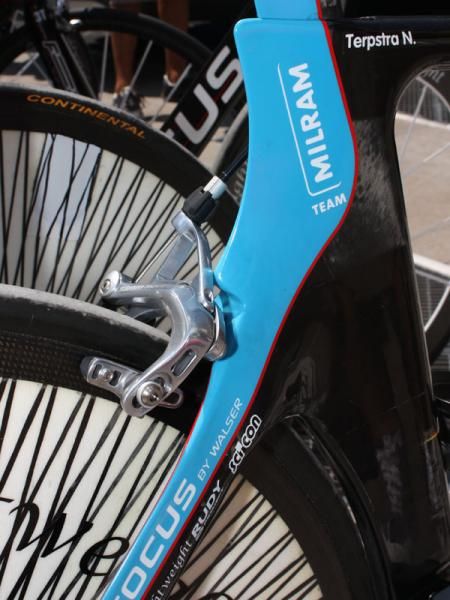 Milram bicycle supplier Focus has apparently given their time trial frames a bit more room out back so they can now accommodate the sponsor-correct SRAM Red brake caliper.