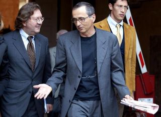 Michele Ferrari leaves a tribunal in Bologna, Italy in 2004
