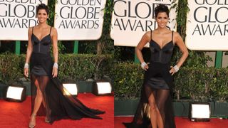 halle berry in a black strappy mini dress with sheer train at the 2011 golden globes