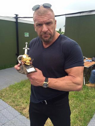 Triple H with the Spirit Of Lemmy Award