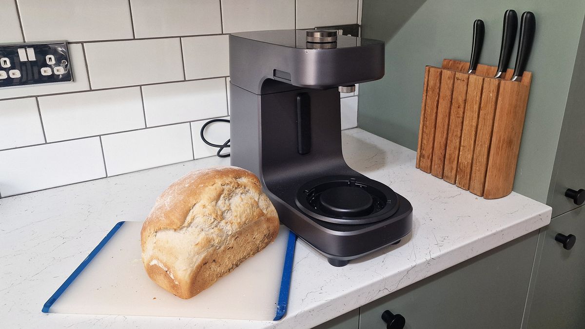 The Ooni Halo Pro Spiral mixer being tested in a green and white kitchen