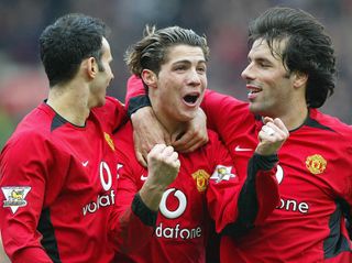 Cristiano Ronaldo, centre, celebrates an early United goal with Ryan Giggs, left, and Ruud Van Nistelrooy