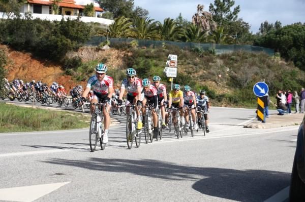 Omega Pharma-Lotto heads the peloton in pursuit of Oleg Chuzhda, the lone breakaway rider.