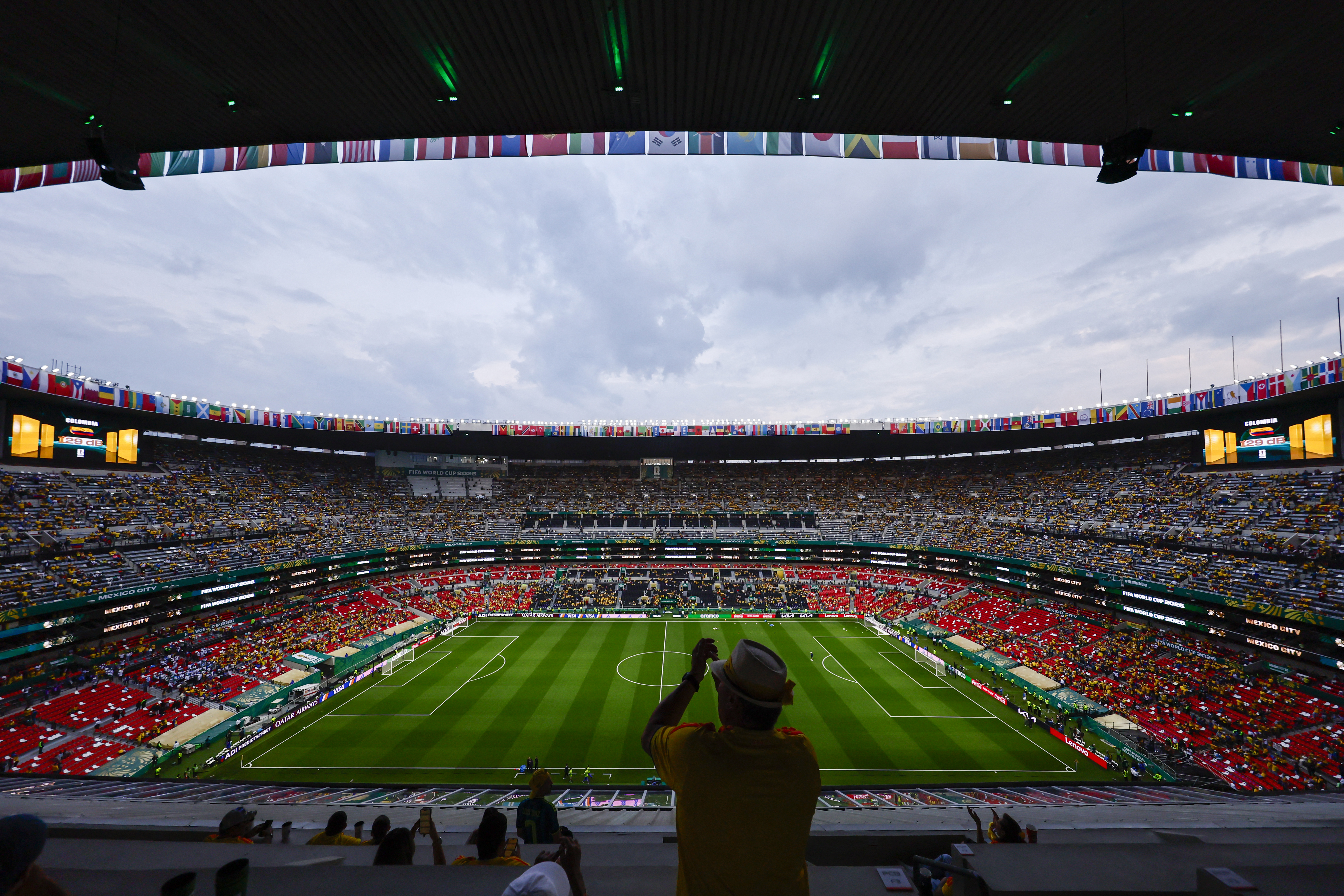 A Colombian fan stands ahead of the 2026 World Cup Group K football match between Uzbekistan and Colombia at the Mexico City Stadium in Mexico City on June 17, 2026.  (Photo by Rodrigo Oropeza / AFP)
