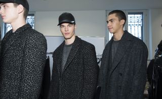 Male models wearing stylish wool coats from A/W 2015 Calvin Klein Collection.