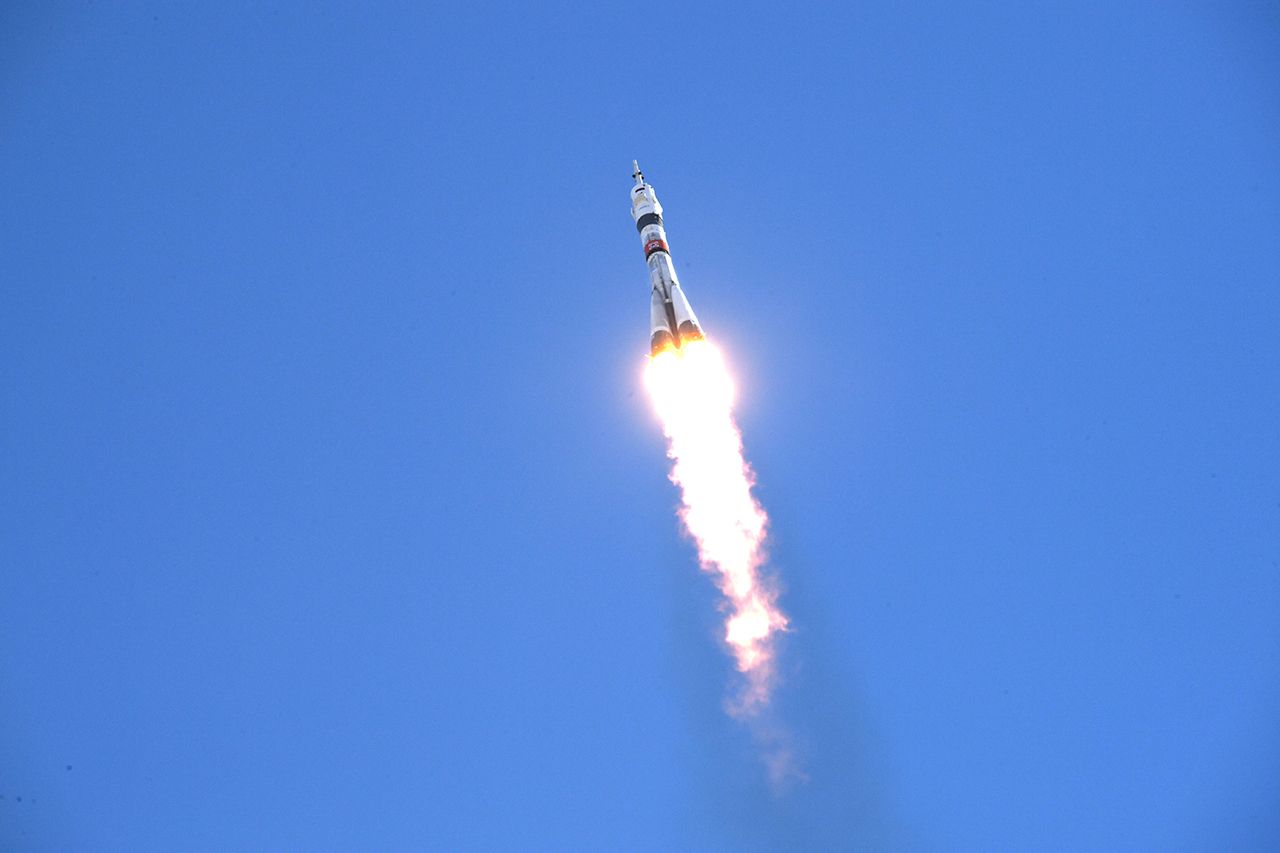 A Russian Soyuz MS-17 spacecraft launches atop a Soyuz rocket from Baikonur Cosmodrome, Kazakhstan on Oct. 14, 2020 to ferry NASA astronaut Kate Rubins and Russian cosmonauts Sergey Ryzhikov and Sergey Kud-Sverchkov to the International Space Station.