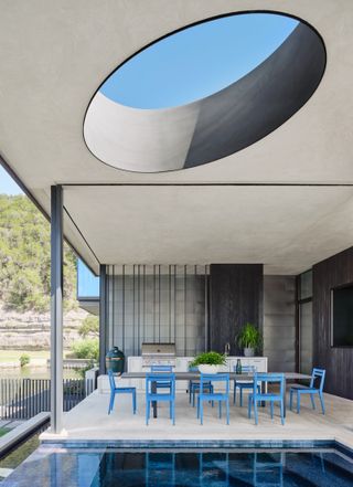 A kitchen situated within a pool house