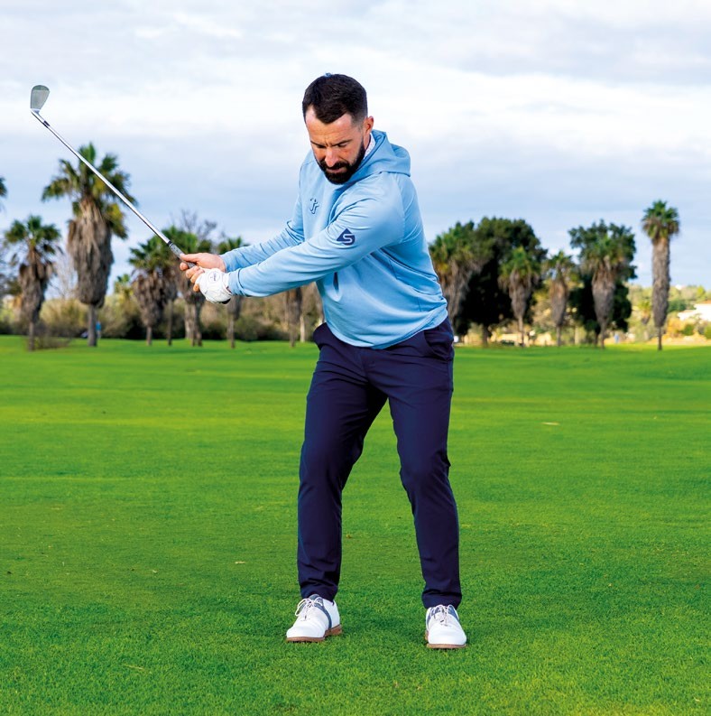 James Jankowski demonstrating the continuous step drill position two (backswing)