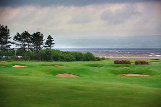 The excellent par-4 3rd at Caldy sweeps down to the Dee estuary